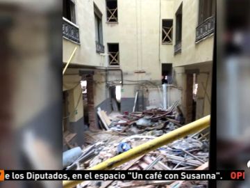 La lluvia complica el trabajo de los bomberos en la tercera noche desde el derribo de un edificio en Madrid