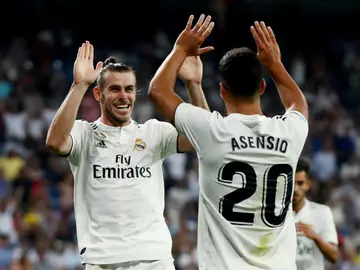 Asensio celebra con Bale el gol del galés ante el Getafe Asensio celebra con Bale el gol del galés ante el Getafe