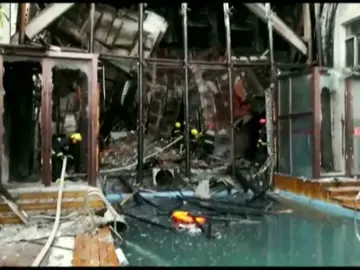 Al menos 18 muertos por un incendio en un hotel en el noreste de China Al menos 18 muertos por un incendio en un hotel en el noreste de China