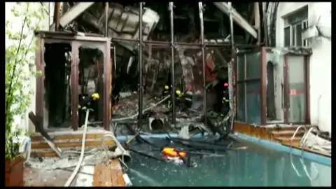 Al menos 18 muertos por un incendio en un hotel en el noreste de China Al menos 18 muertos por un incendio en un hotel en el noreste de China