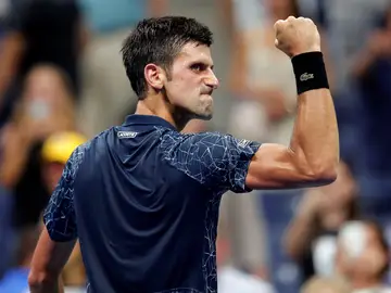 Djokovic celebra un punto contra Millman Djokovic celebra un punto contra Millman
