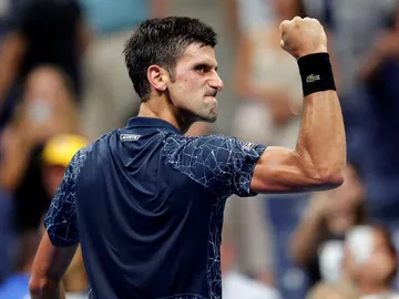 Djokovic celebra un punto contra Millman Djokovic celebra un punto contra Millman
