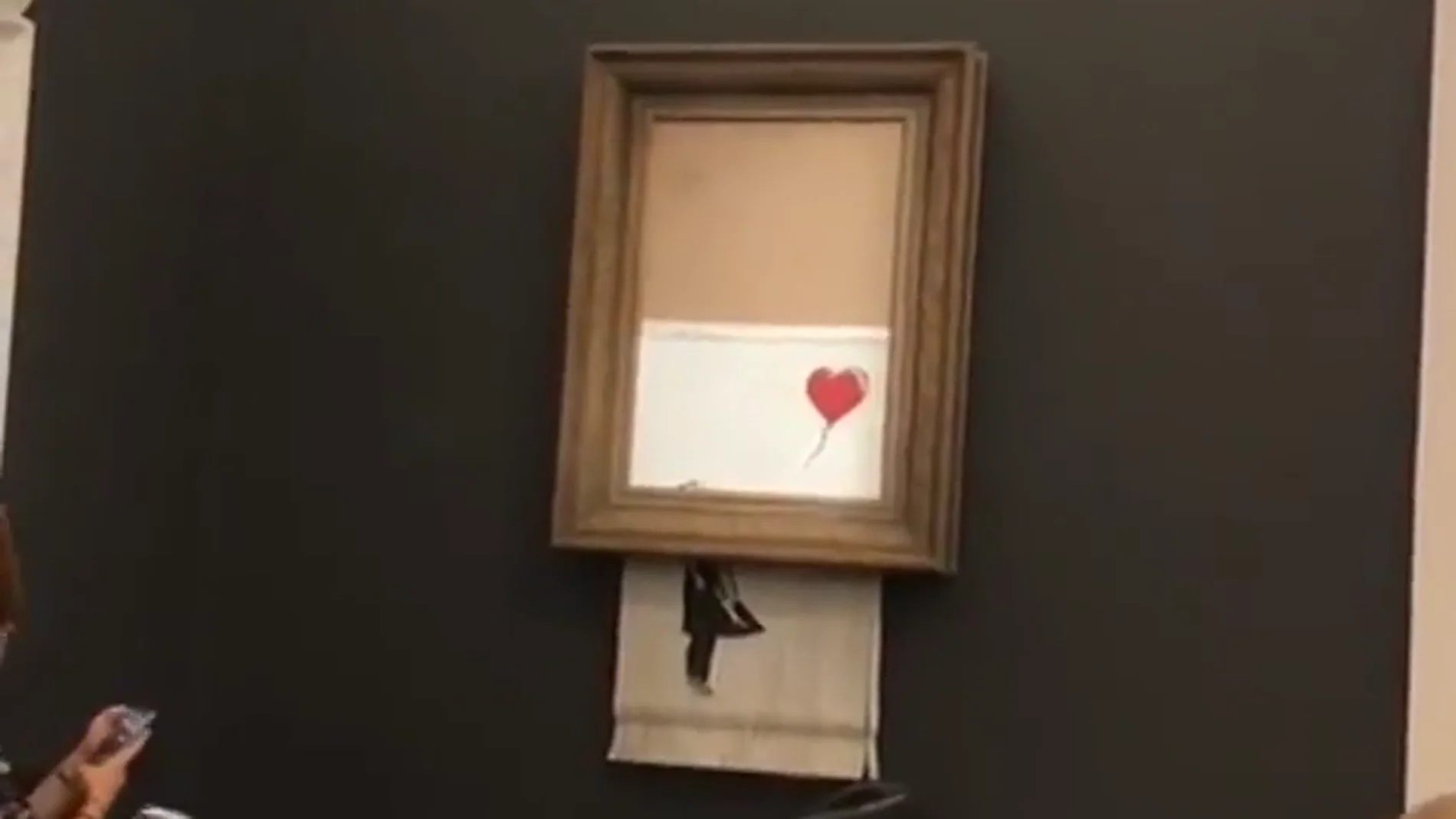 El cuadro de Banksy autodestruyéndose El cuadro de Banksy autodestruyéndose