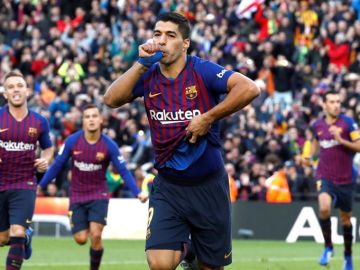 Luis Suárez celebra un gol ante el Madrid