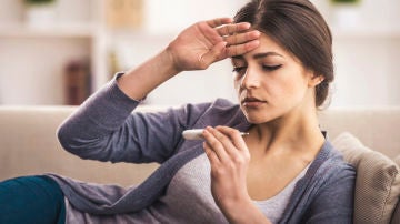 Mujer con fiebre