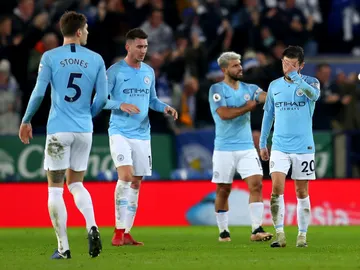 Los jugadores del City lamentan un gol en contra Los jugadores del City lamentan un gol en contra