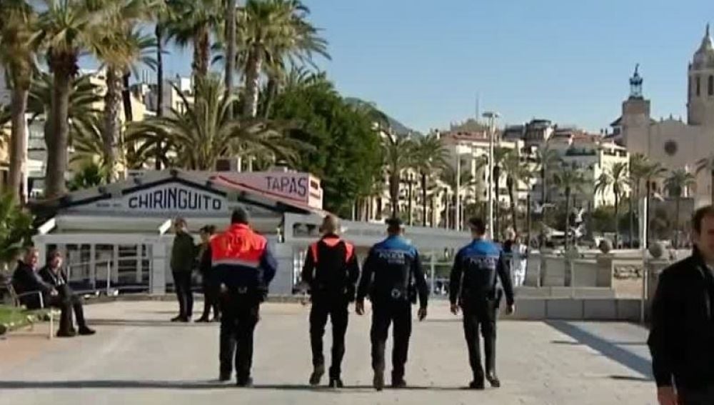 Policía y agentes de seguridad privada en Sitges