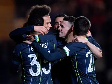 Los jugadores del Manchester celebran un gol Los jugadores del Manchester celebran un gol