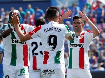 Los jugadores del Leganés celebran uno de los goles contra el Getafe
