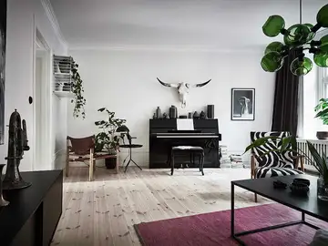 Salón estilo nórdico en tonos negro y madera Salón estilo nórdico en tonos negro y madera