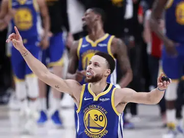 Stephen Curry celebra una canasta ante los Blazers Stephen Curry celebra una canasta ante los Blazers