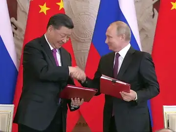 Putin y Xi escenifican la buena relación bilateral, en "un nivel sin precedentes" Putin y Xi escenifican la buena relación bilateral, en "un nivel sin precedentes"