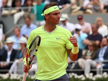Nadal celebra un punto ante Thiem en la final de Roland Garros Nadal celebra un punto ante Thiem en la final de Roland Garros
