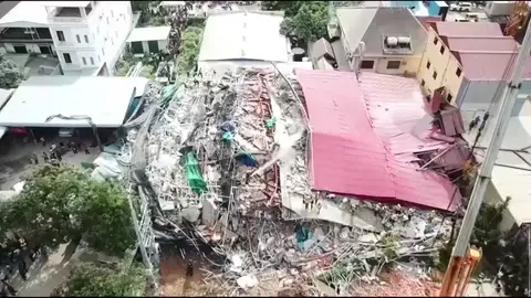 Siete muertos y más de 30 heridos al derrumbarse un edificio en Camboya Siete muertos y más de 30 heridos al derrumbarse un edificio en Camboya
