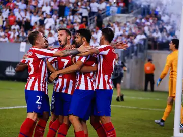 Los jugadores del Atlético celebran un gol de Diego Costa ante el Real Madrid Los jugadores del Atlético celebran un gol de Diego Costa ante el Real Madrid