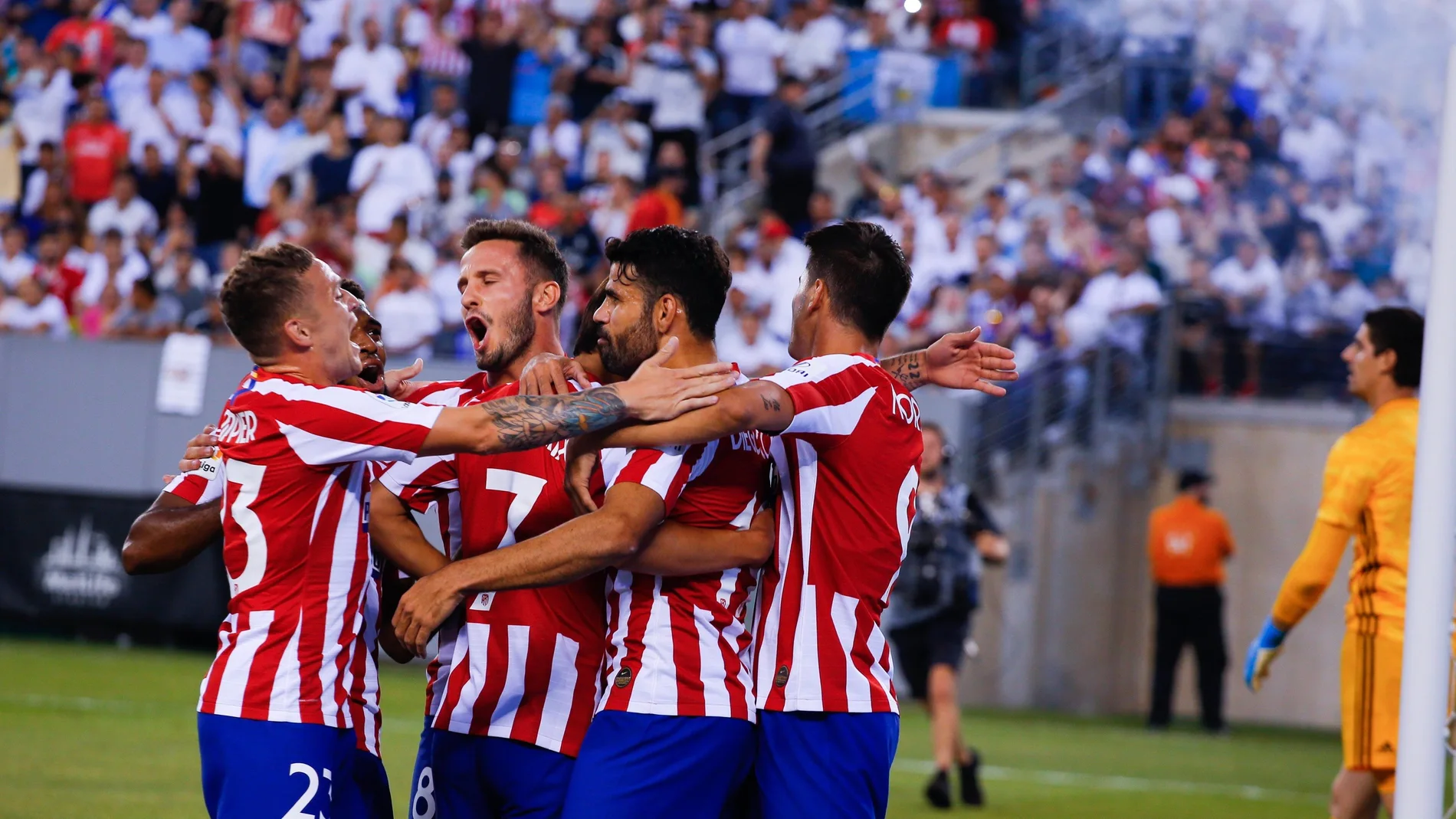 Los jugadores del Atlético celebran un gol de Diego Costa ante el Real Madrid Los jugadores del Atlético celebran un gol de Diego Costa ante el Real Madrid