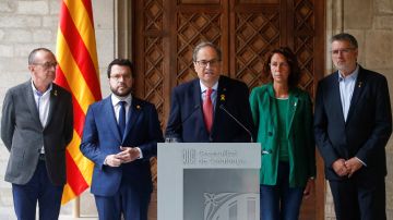 El presidente de la Generalitat, Quim Torra, junto a su vicepresidente El presidente de la Generalitat, Quim Torra, junto a su vicepresidente