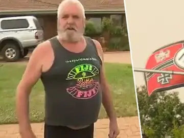 Una pareja tiene colgada una bandera nazi en su jardín Una pareja tiene colgada una bandera nazi en su jardín