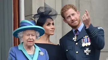 Meghan Markle, el príncipe Harry y la reina Isabel II