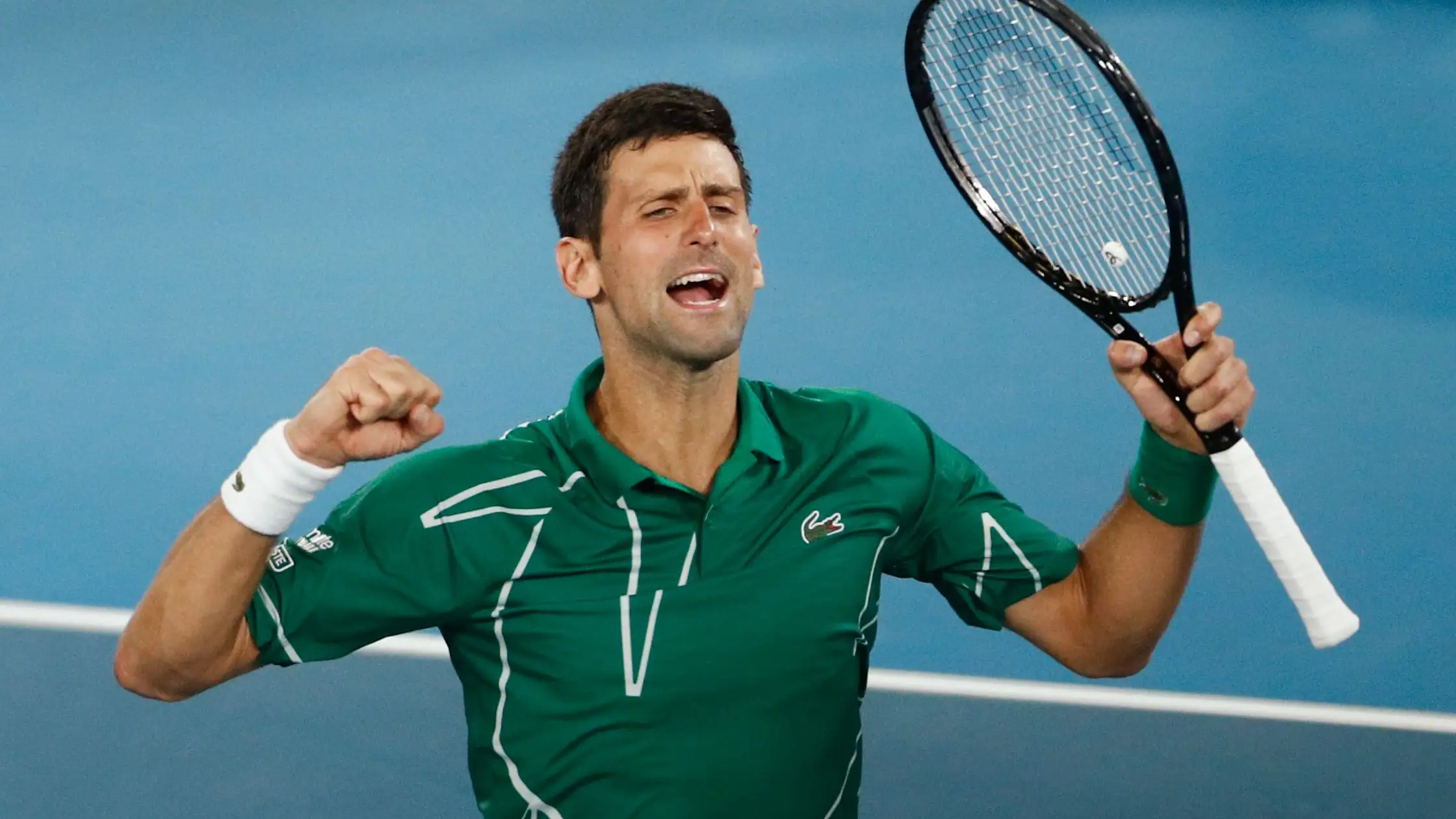 Djokovic celebra la victoria ante Federer