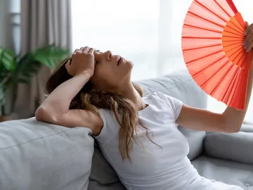 Mujer con calor Mujer con calor