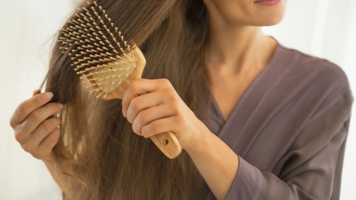 Cepillándose el pelo
