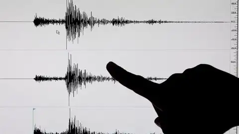 Imagen de archivo de un terremoto en un sismógrafo Imagen de archivo de un terremoto en un sismógrafo