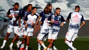 Los jugadores del Real Madrid, durante un entrenamiento