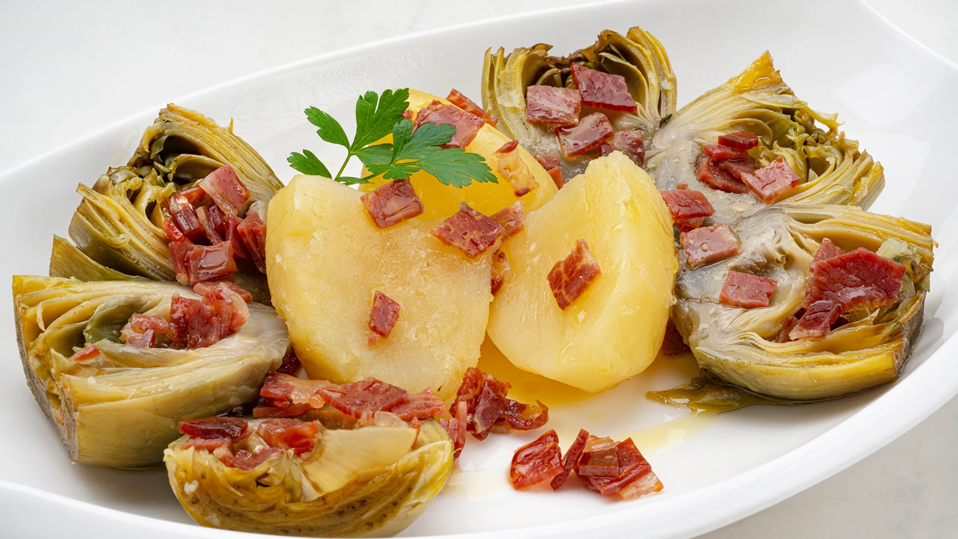 Receta de alcachofas con patatas y jamón, de Karlos Arguiñano