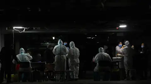 Las autoridades chinas reciben al equipo de la OMS Las autoridades chinas reciben al equipo de la OMS