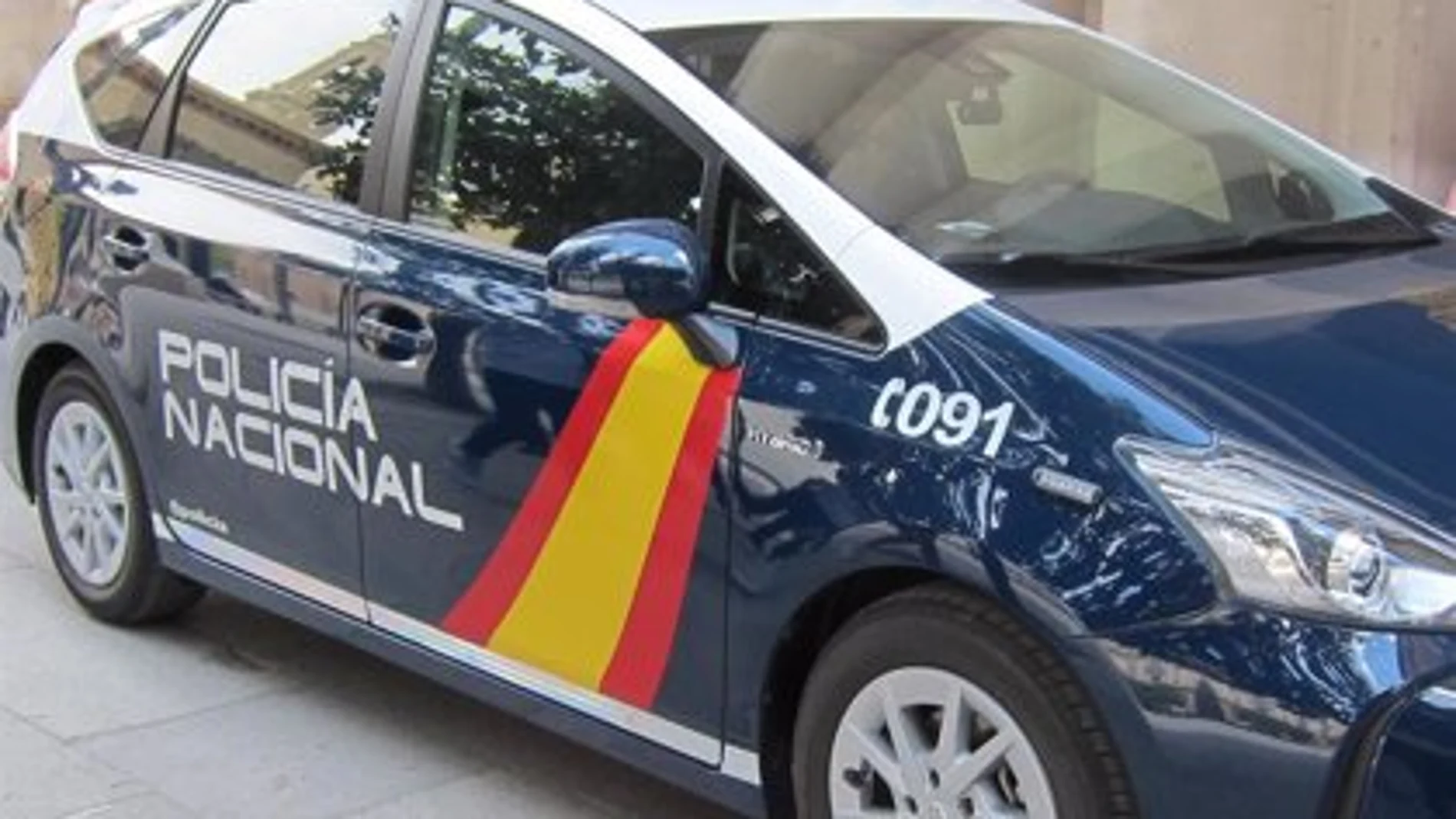 Un coche patrulla Un coche patrulla