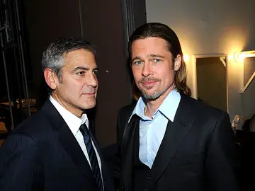 George Clooney y Brad Pitt George Clooney y Brad Pitt