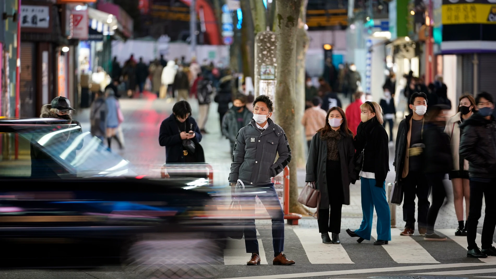 Personas en las calles de Japón con mascarilla por el coronavirus Personas en las calles de Japón con mascarilla por el coronavirus