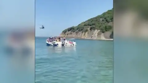 Persecución en una playa de Algeciras Persecución en una playa de Algeciras