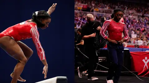 Simone Biles en el momento de cometer un error en la barra de equilibrio Simone Biles en el momento de cometer un error en la barra de equilibrio