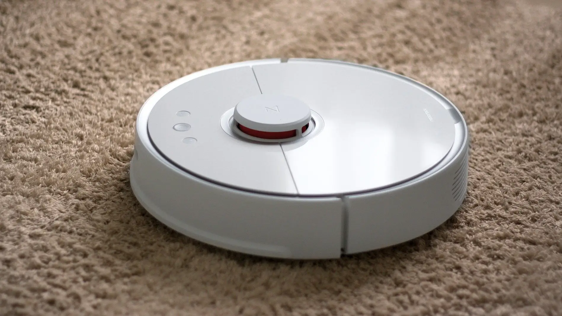 Un robot aspirador Un robot aspirador