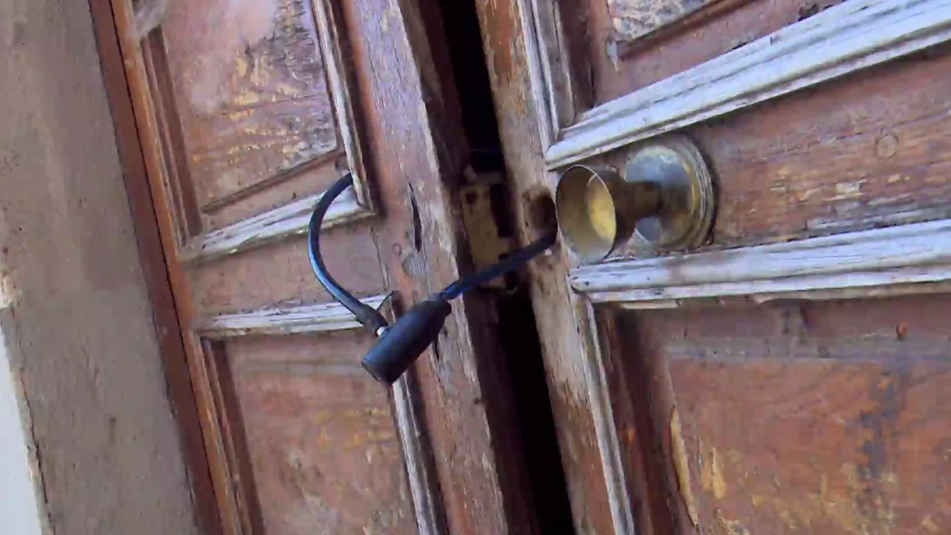 Okupa Zaragoza: El propietario cierra la puerta con candado y la okupa llama a la policía para que le abra