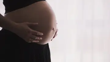 Imagen de archivo de una mujer embarazada Imagen de archivo de una mujer embarazada