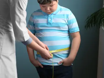 Niño con sobrepeso Niño con sobrepeso
