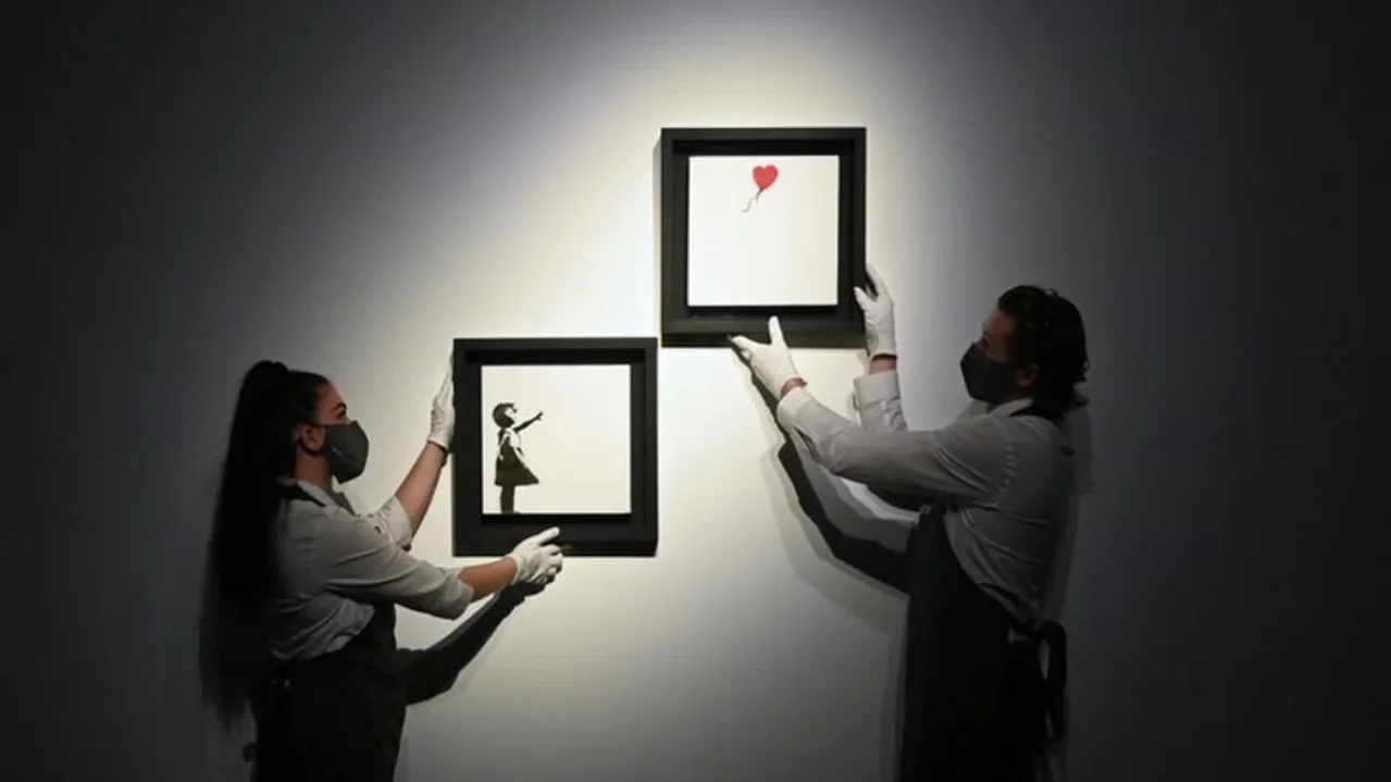  Banksy bate su propio r&eacute;cord al venderse por casi 22 millones de euros el autodestruido 'Ni&ntilde;a con Globo'