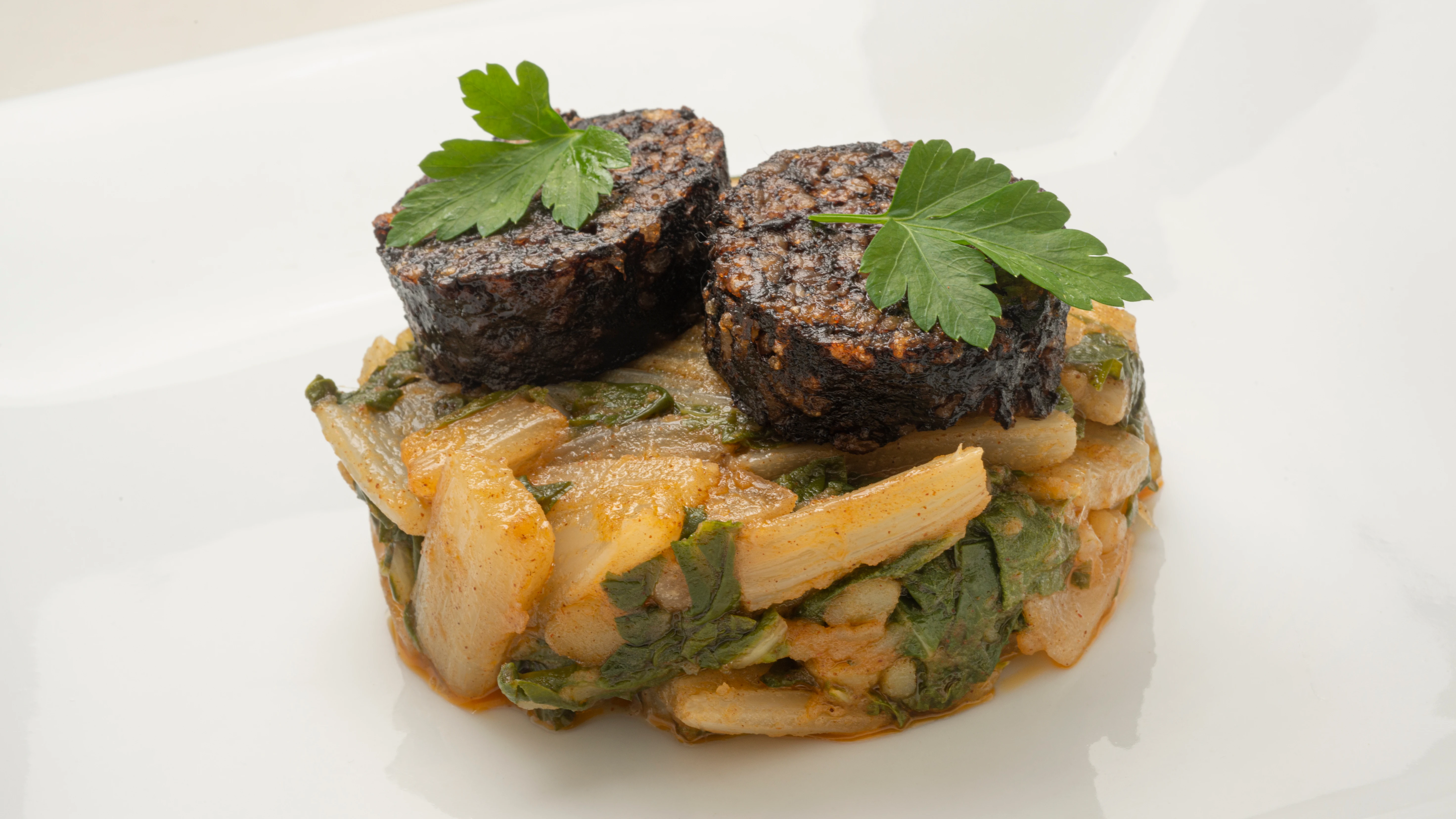 Acelgas con morcilla de arroz