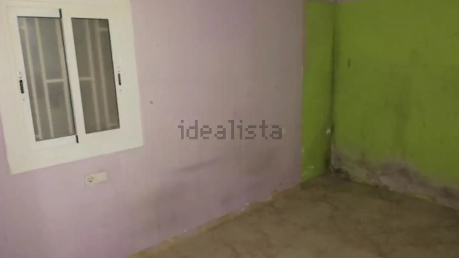 El dormitorio de este piso de Idealista situado en Barcelona