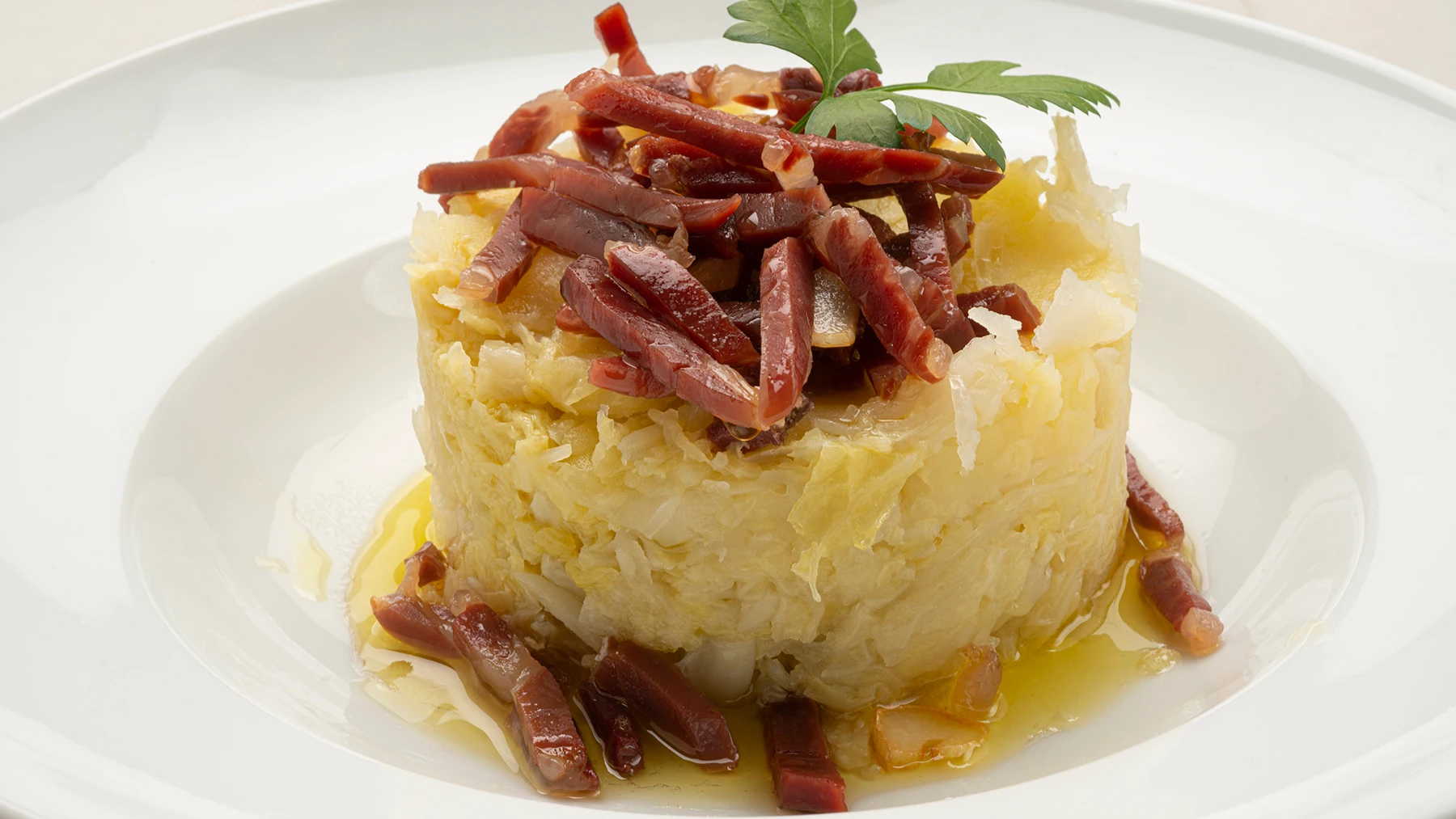 Receta saludable, barata y sabrosa de Argui&ntilde;ano: col con patatas y jam&oacute;n