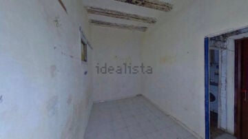 Una de las habitaciones de este piso de Idealista