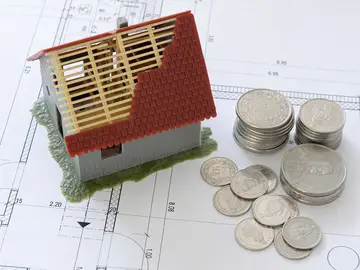 Recreación de una casa y dinero Recreación de una casa y dinero