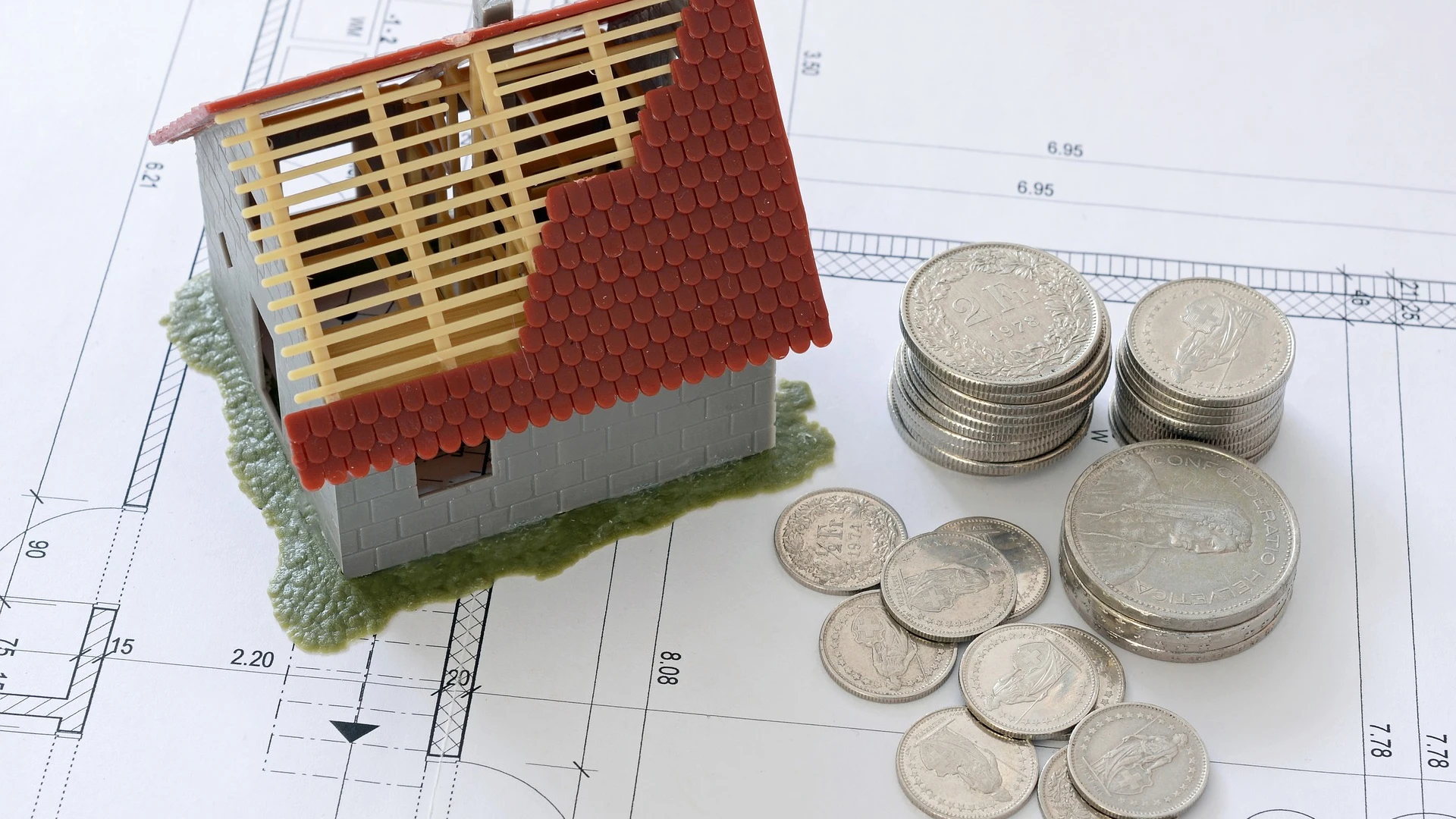 Recreación de una casa y dinero Recreación de una casa y dinero