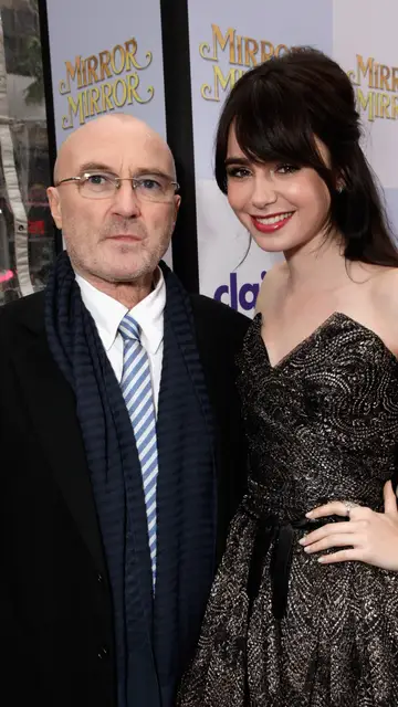 Lily Collins con su padre, el artista Phil Collins Lily Collins con su padre, el artista Phil Collins