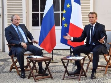 Vladimir Putin y Emmanuel Macron en una foto de archivo
