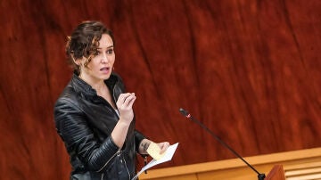 La presidenta de la Comunidad de Madrid, Isabel Díaz Ayuso, interviene durante el pleno de la Asamblea de Madrid este jueves