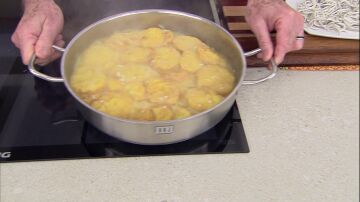 La patatas cocinadas en salsa.
